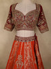 Vibrant Orange Floral Sequins and Beads Embroidered Design Banarasi Silk Bridal Lehenga with Designer Dupatta