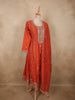 Vibrant Rusty Orange Floral Zari Embroidered Design Tissue Silk Salwar Suit with Dupatta