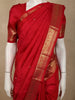 Vibrant Vermilion Red Butta Zari Woven Design Pure Kanchipuram Silk Saree with Peacock Zari Border