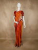 Warm Burnt Orange Floral Butta Woven Design Pure Kanchipuram Silk Saree with Contrast Peacock Zari Border
