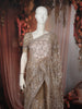 Warm Champagne Beige Heavy Sequins Embroidered Design Net Party Wear Saree with Designer Border