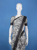 White Abstract Printed Semi Tussar Saree With Contrast Border
