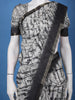 White Abstract Printed Semi Tussar Saree With Contrast Border