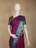 Wine Purple Striped Woven Kanchipuram Silk Saree with Contrast Peacock Blue Border