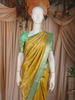 Yellow Floral Woven Pure Kanchipuram Silk Saree with Zari Border