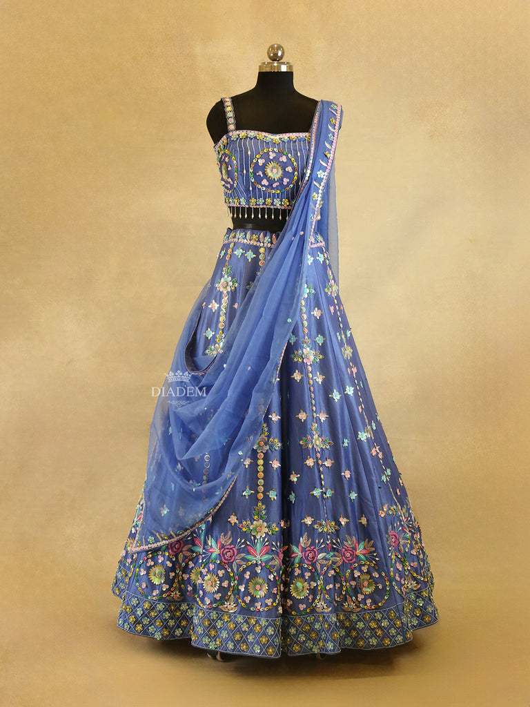 Blue Raw Silk Lehenga Adorned with 3D Flower and Sequins