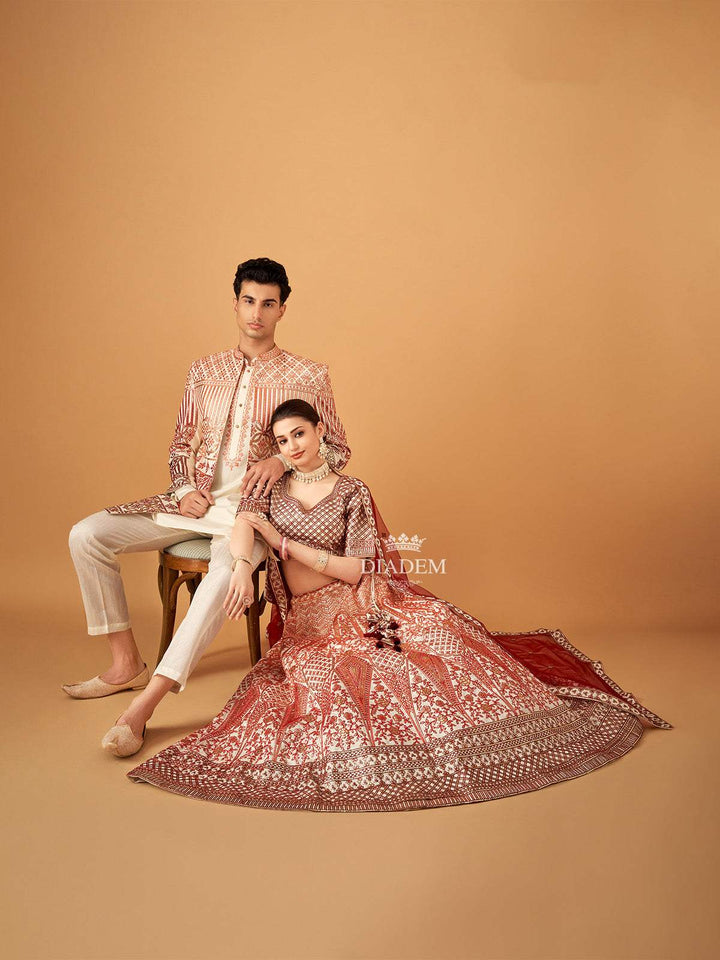 Beige with Orange Couple Pair Set Dress Adorned with Floral Embroidered Lehenga and Sherwani - Diadem