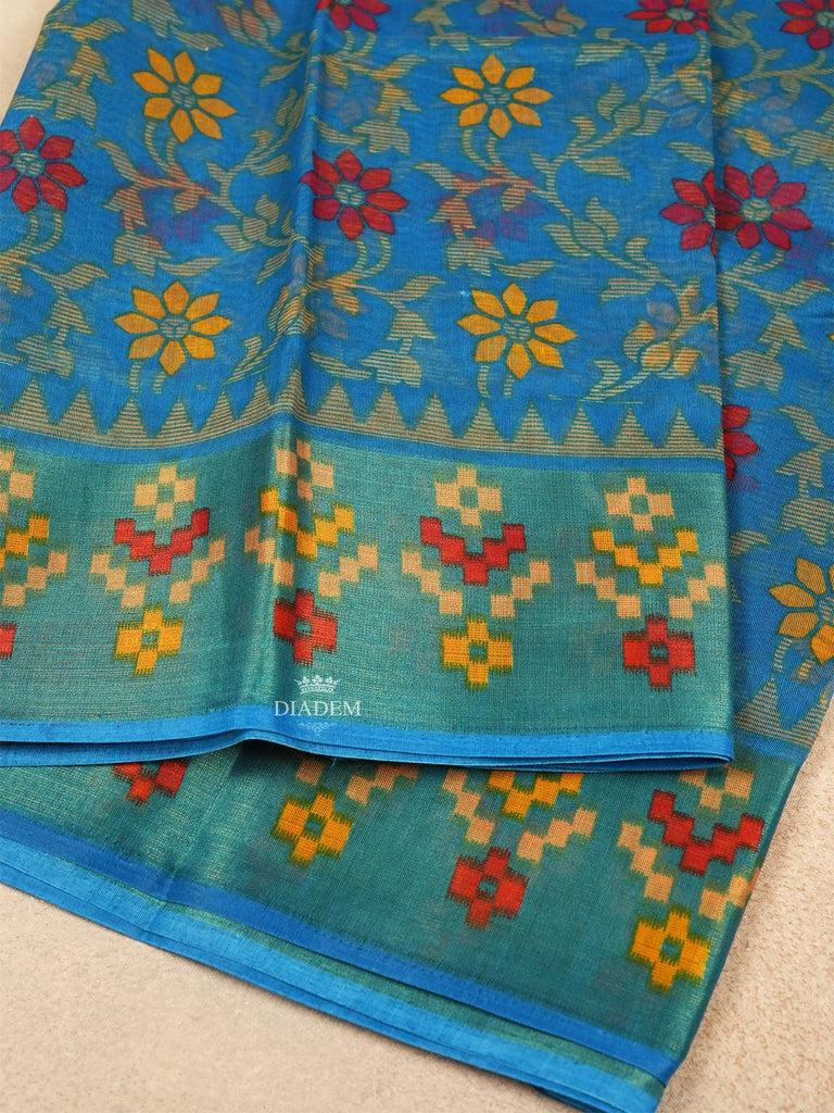 Elegant Blue Saree with Floral Patterns