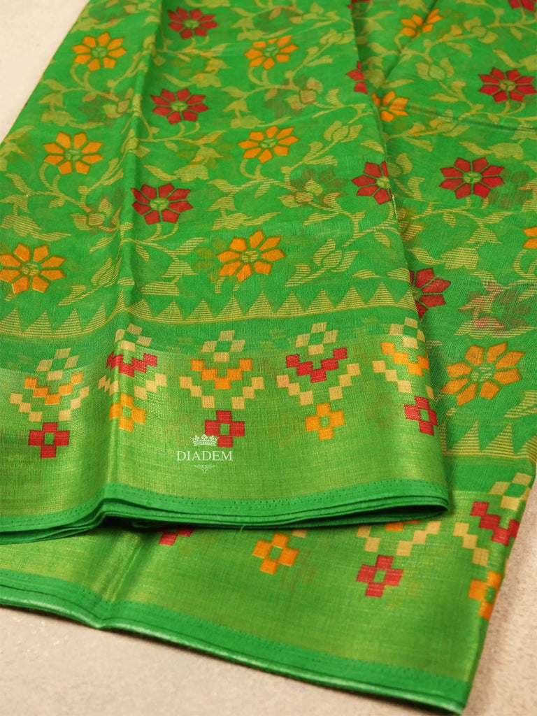 Elegant Green Saree with Floral Patterns