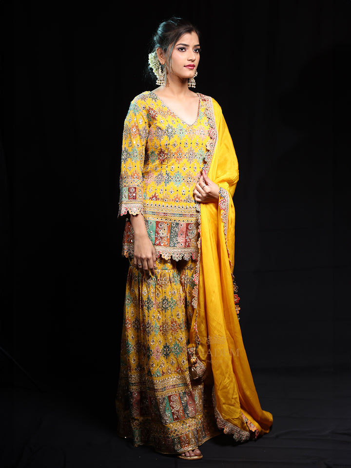 Stylish Yellow Sharara Salwar Suit with Floral