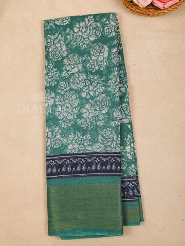 Green Cotton Saree With Floral Patterns On the Body with Matching Border - Diadem