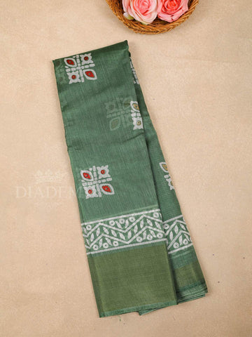 Green Cotton Saree With Geometric Patterns On the Body with Matching Border - Diadem