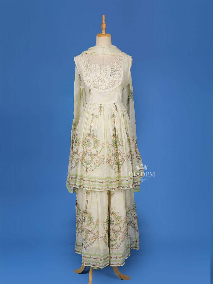 Ivory Cotton Sharara Salwar Suit Adorned with Printed Floral Design and Lace work, Paired with Dupatta - Diadem