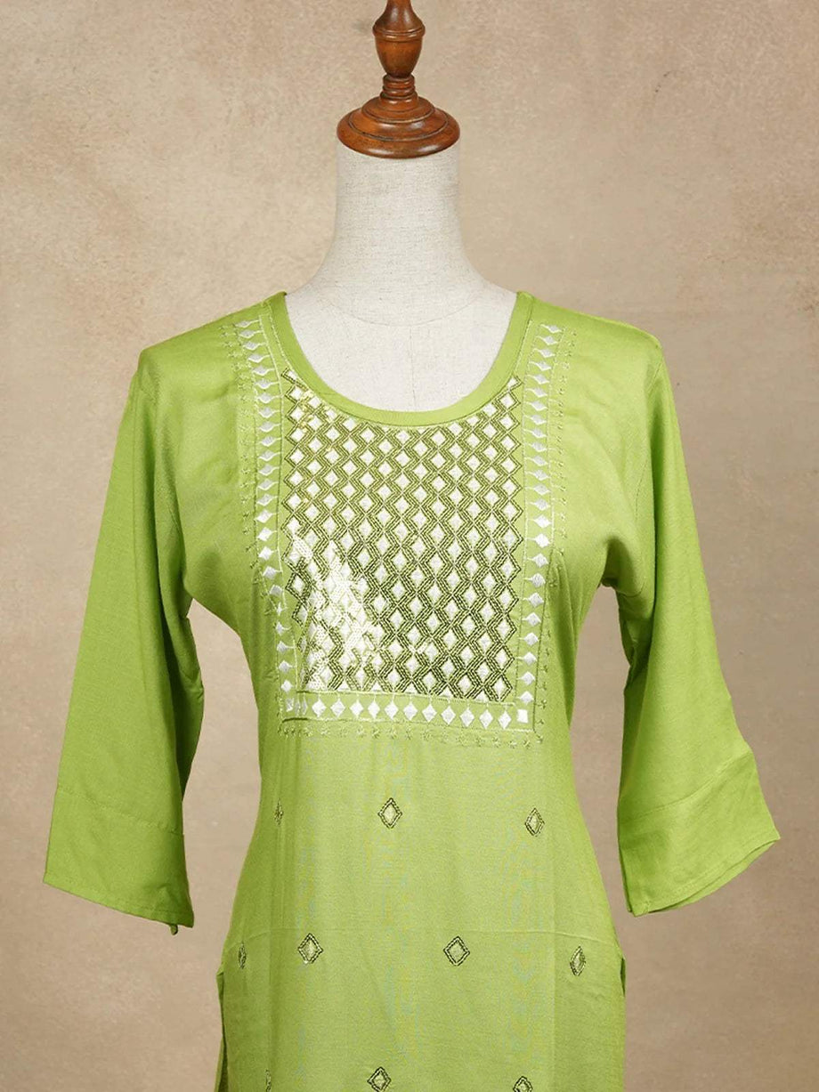 Buy Green Cotton Kurtis Adorned With Diagonal Designs Online