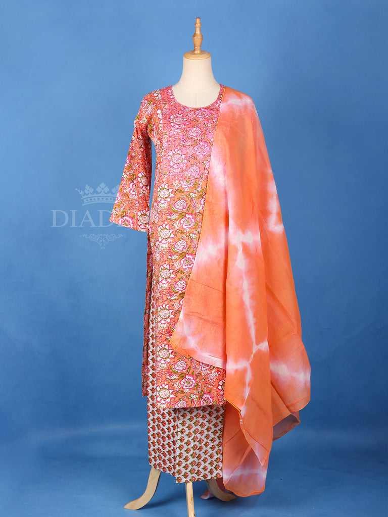 Light Orange Cotton Salwar Suit with Floral Print