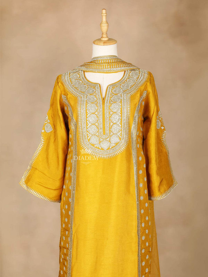 Mustard Yellow Straight Cut Salwar Suit Adorned With Floral Designs, with 3/4 Sleeve and Matching Dupatta - Diadem