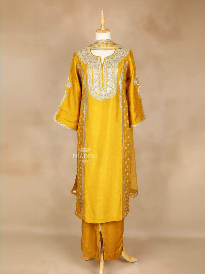 Mustard Yellow Straight Cut Salwar Suit Adorned With Floral Designs, with 3/4 Sleeve and Matching Dupatta - Diadem