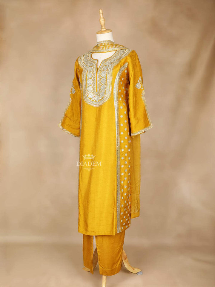 Mustard Yellow Straight Cut Salwar Suit Adorned With Floral Designs, with 3/4 Sleeve and Matching Dupatta - Diadem