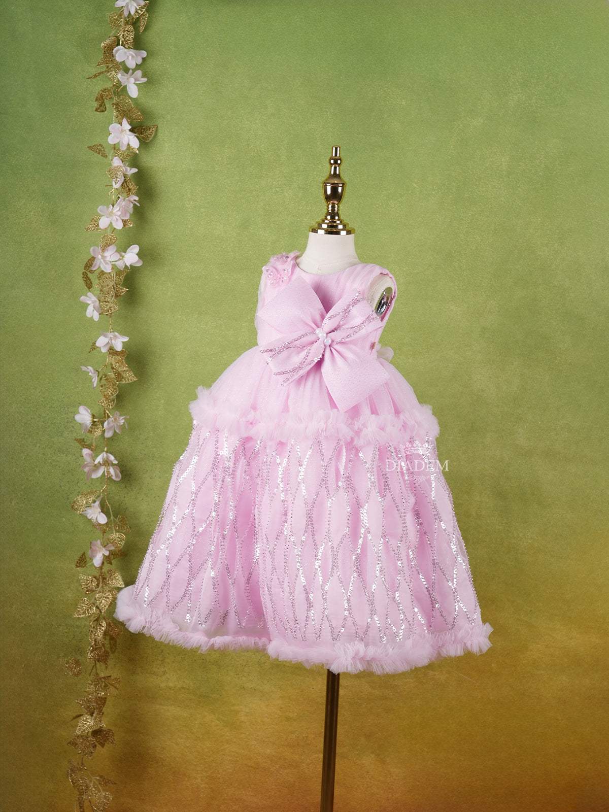 Pink Net Gown Adorned With Sequins, Big Bow and Butterflies Diadem