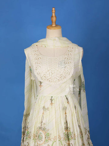 Ivory Cotton Sharara Salwar Suit Adorned with Printed Floral Design and Lace work, Paired with Dupatta - Diadem