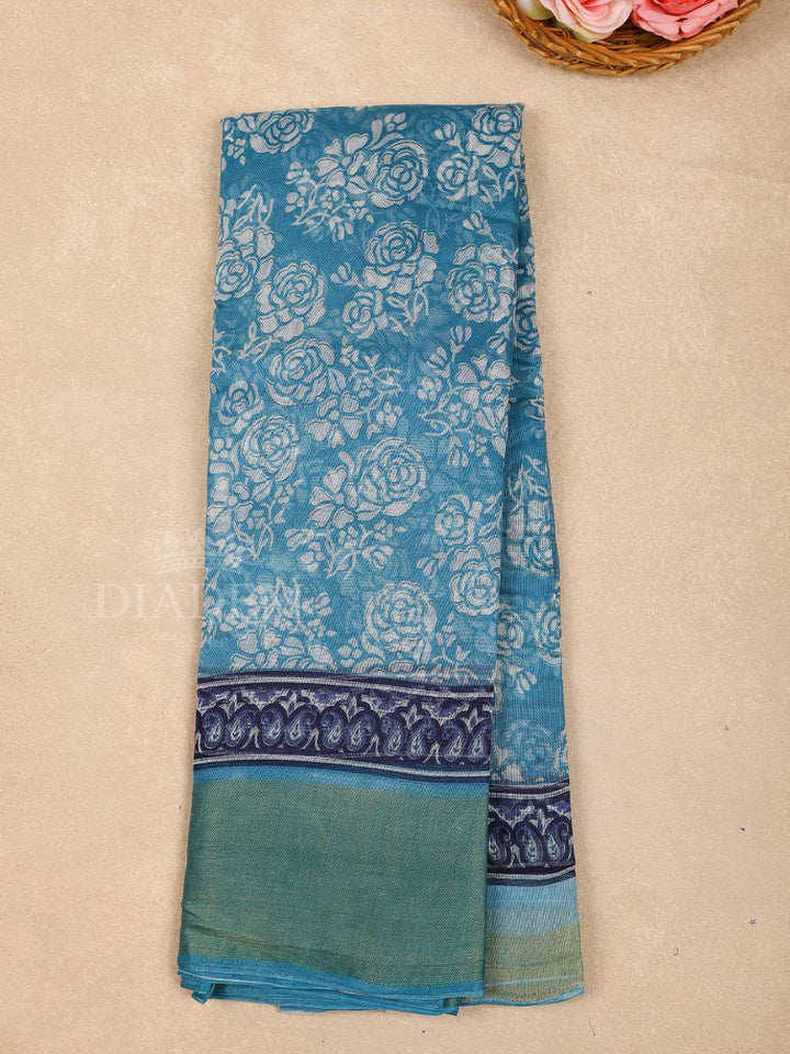 Sky Blue Cotton Saree With Floral Patterns On the Body with Matching Border - Diadem