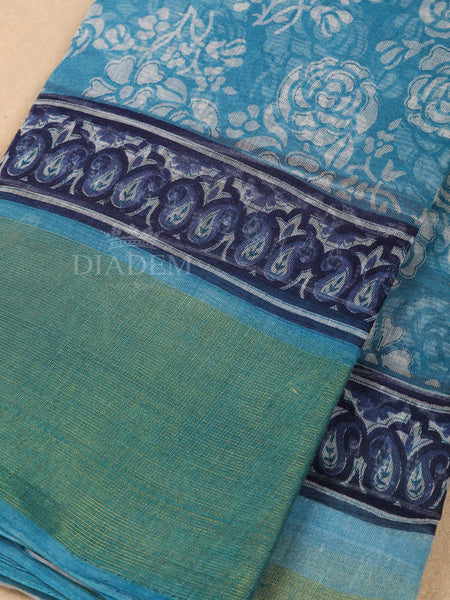 Sky Blue Cotton Saree With Floral Patterns On the Body with Matching Border - Diadem