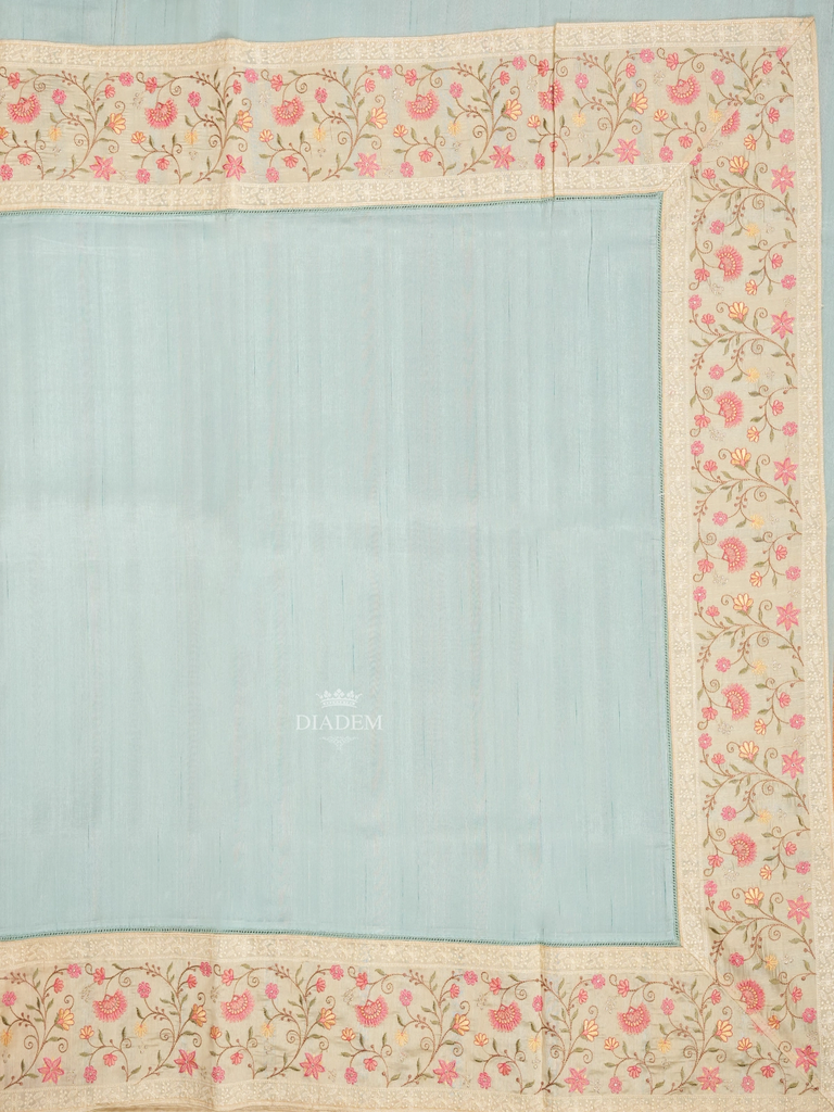 Solid Body Sky Blue Tussar Silk Saree with Flower Border