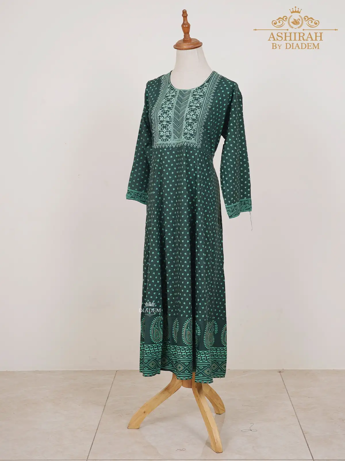 Dark Green Kurti With Thread Cut Embroideries And Floral Prints