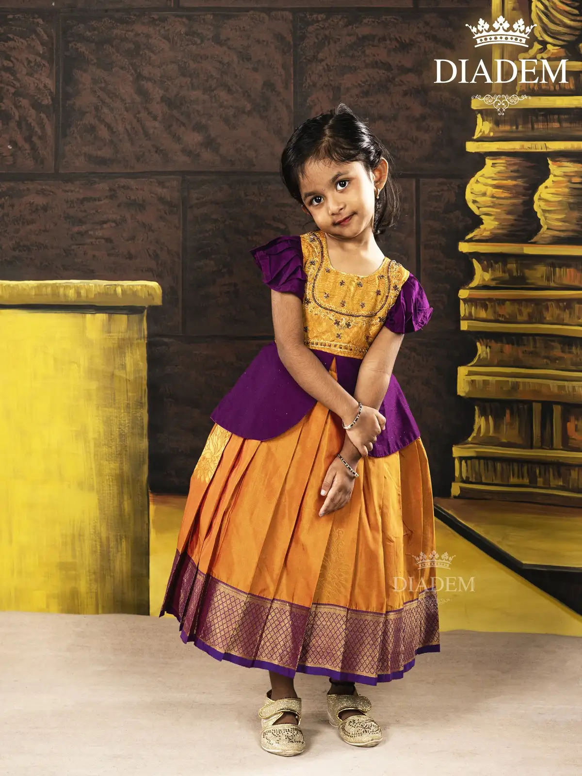 Orange with Purple Pattu Pavadai and Embroidery Top Adorned in Zaris
